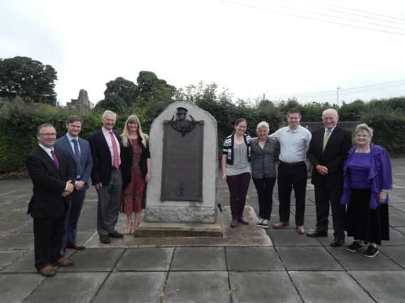 Mrs. Valerie Beattie (right) and Dr. David Hume (left) with the immediate descendants of General Steele who attended Saturday's ceremony. Over 20 members of the family travelled to the village for the interment of the ashes of Rachel Stuart Caldwell, daughter of General Sir James Stuart Steele.