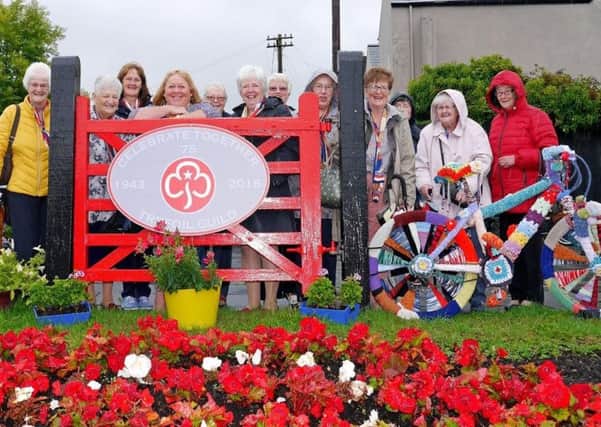 Larne members marking the 75th anniversary of the Trefoil Guild.