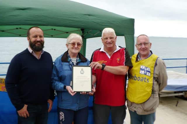Pictured, receiving their certificate for their support in raising vital funds for the RNLI, are Paul Abraham, Commodore CAYC, Freda Robinson, chairperson Carrickfergus and Whitehead RNLI, Richard Todd, Vice Commodore CAYC  and Noel Lamont Carrickfergus and Whitehead RNLI.