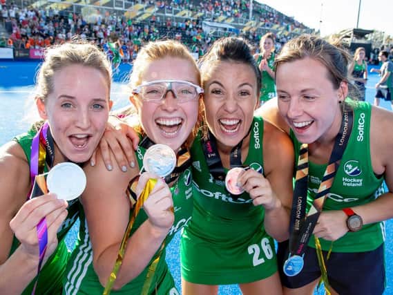 Ireland's Nicola Daly, Zoe Wilson, Anna O'Flanagan and Megan Frazer celebrate with their silver medals.  Mandatory Credit INPHO/Morgan Treacy