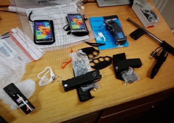 Weapons, including stun guns, seized by police in Larne