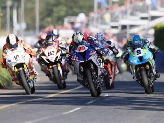 Peter Hickman (60) gets the jump on Dean Harrison (9) and Conor Cummins (10) in the second Superbike race at last year's Ulster Grand Prix.