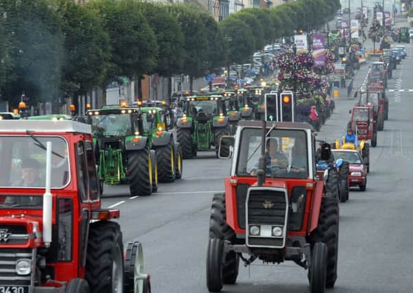 Cookstown Main Street comes to a standstill as the convoy of hundreds of tractors makes their way through the town as part of the Oliver-James McCrea Memorial Tractor Run.
