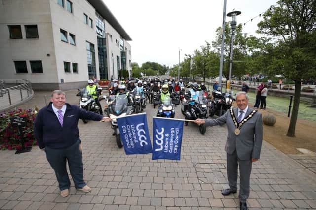 Alderman Paul Porter, Chairman of the Council's Leisure & Community Development Committee and the Mayor, Councillor Uel Mackin get ready to start the Classic Motorcycles on their Parade Lap of the UGP Circuit, leaving from Lagan Valley Island.