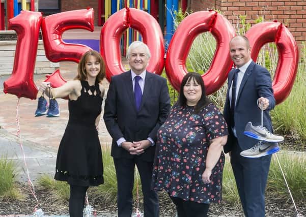 Lynsey Weir (William Coates), Paul Weir (Chairman of William Coates),  Fiona McCann (Corporate Fundraising Manager for Mencap NI) and Ryan Scott (Director from William Coates).