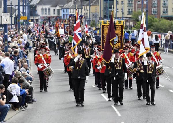 The head of the annual Relief of Derry parade makes its way across Craigavon Bridge