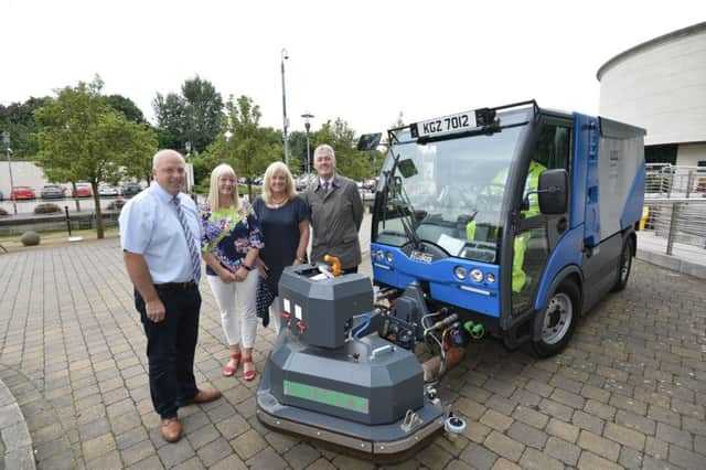 Pictured with the new street sweeper that will provide a deep clean and assist with the challenge of chewing gum removal in the public realm areas of Lisburn Castlereagh are: Alderman James Tinsley, Vice-Chair of the Council's Environmental Services Committee; Viki Bell, Regional Development Office, Department for Communities; Heather Moore, Director of Environmental Services and John Downey, Department for Communities.