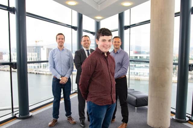 Caolan McKendry from Dalriada School, Ballymoney with Kainos CodeCamp judges Cormac Quinn, Founder & CEO at Loyalbe; SÃ¸renÂ Rode Adreasan, Chief Digital Officer, Danske Bank and Chris Sherrard, Editor, Belfast Live.