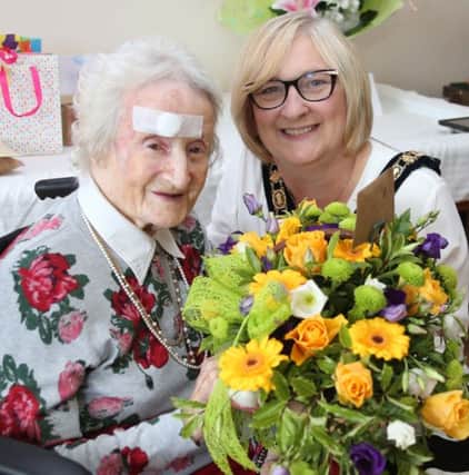 Beattie Taylor, pictured on her 103rd birthday, enjoys a visit from the Mayor of Causeway Coast and Glens Borough Council, Councillor Brenda Chivers, to mark the very special occasion.PICTURE KEVIN MCAULEY/MCAULEY MULTIMEDIA
