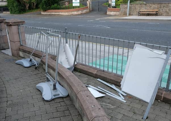 Signage destroyed outside the Camera + shop in Cookstown