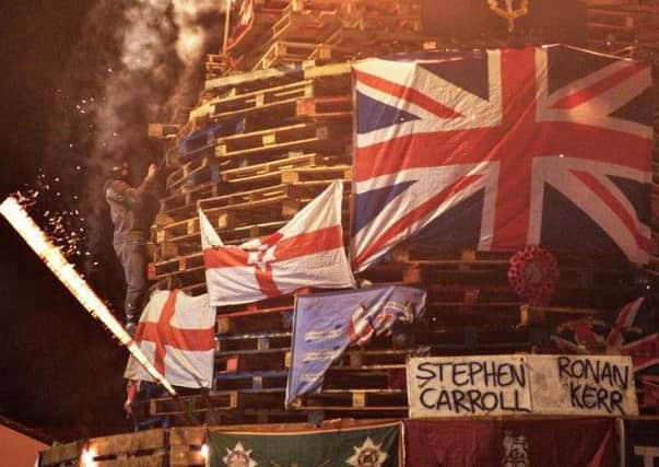 The names of murdered PSNI officers where placed on a controversial bonfire in the Bogside on Wednesday night.