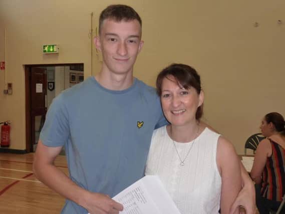 Downshire School student Harry Butler with his proud mum.  Harry achieved A,A,B in his AS levels.