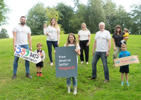 From left Tim Reynolds (organiser) Felix Millington (aged 5), Aoife Reaper-Reynolds and her daughter Maya, Olyvia Millington holding the poster at the front, Kerry Millington, Tim Reynolds father Gordon who is a retired church pastor and former probation officer, Mel Wiggins OBE with her daughter Ada (age 2) and Levi Wiggins (age 7)