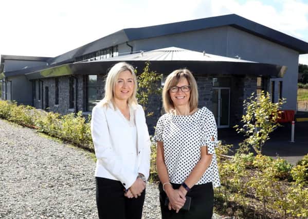 Pictured at the new Â£1.1million centre are Sheila Donaghy, Business Manager at Ulster Bank and Reverend Dorothy McVeigh of Annaghmore Parish.