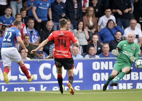 Jamie Mulgrew fires home Linfield's second goal towards victory over Crusaders at Seaview.