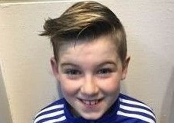 Tributes have been paid to 'kind and caring' Sammy Haveron, aged 11, who has died after taking ill during football training in Larne.