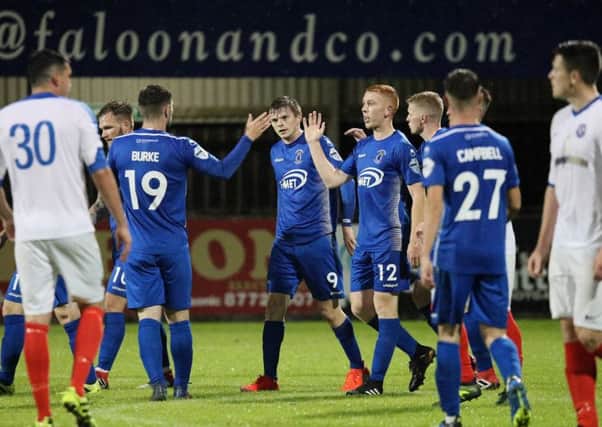 Dungannon's Paul McElroy celebrates his goal against Limavady