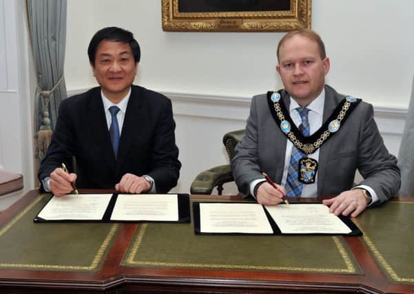 Former Lord Mayor, Alderman Gareth Wilson greeted a delegation from China last year  where he and the First Deputy Mayor of Taizhou, Yang Jie signed a letter of introduction and exchanged gifts.