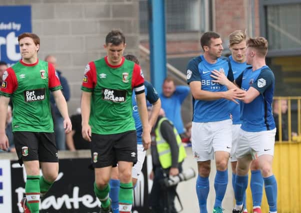 Glenavon celebrate an equaliser off the penalty spot against Glentoran. Pic by Pacemaker.