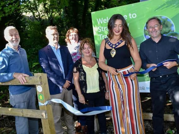The Mayor of Mid and East Antrim Council, Cllr Lindsay Millar, officially opening the new trail at Straidkilly.