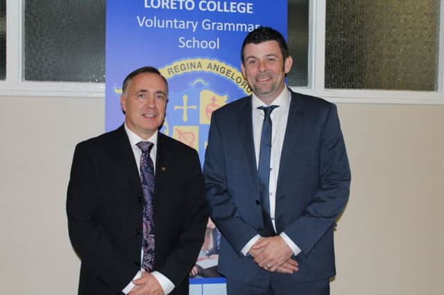 Loreto College Principal Michael James pictured with guest speaker Barry Dallat at the Colleges Senior Prizegiving.