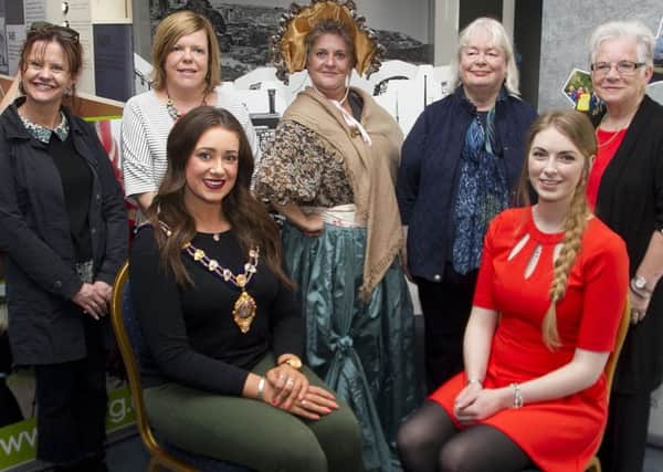 (Back from left): Zoe Seaton, Big Telly Theatre Co; Kelli Baghus, Carrickfergus Enterprise; actress Joanne Donnelly; Mary Watson and Patricia McConnell, Heritage Hub at Carnlough Town Hall volunteers. Front:: Mayor of Mid and East Antrim, Cllr Lindsay Millar and Jodie Jackson, Heritage Lottery Fund.