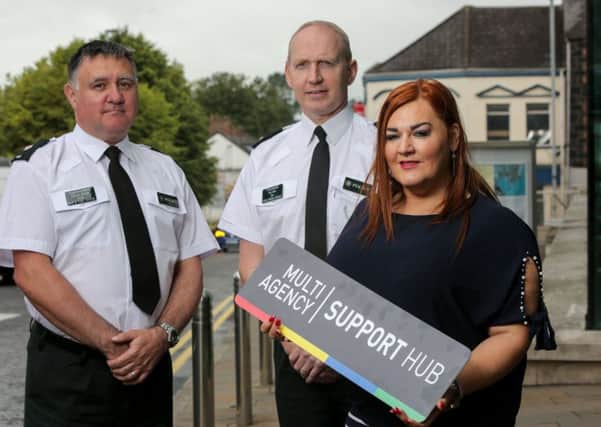 PSNI Superintendents Darrin Jones, Davy Beck and CEO Mid and East Antrim Borough Council Anne Donaghy.
