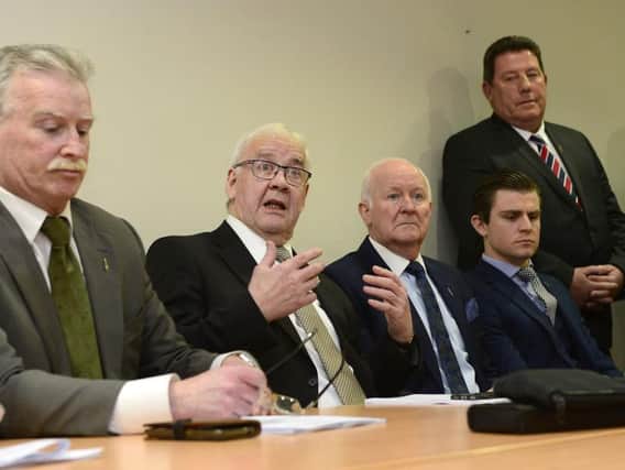 Some of the Hooded Men with solicitor Darragh Mackin and case coordinator Jim McIlmurray