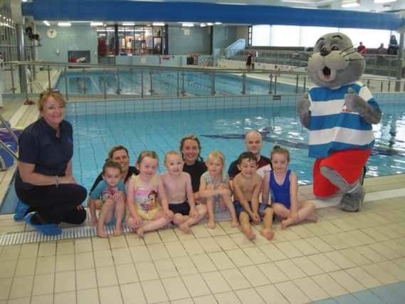 Pictured L to R at the launch of the Councils new getactiveabc Swim School at the Orchard Leisure Centre is the Stanley Swimming Lesson group, Jackie Timms, STA,  Laura Simpson, Swimming Teacher,  Emma Crawford, Swimming Coordinator,  Mark King, Swimming teacher and STAs mascot Stanley.