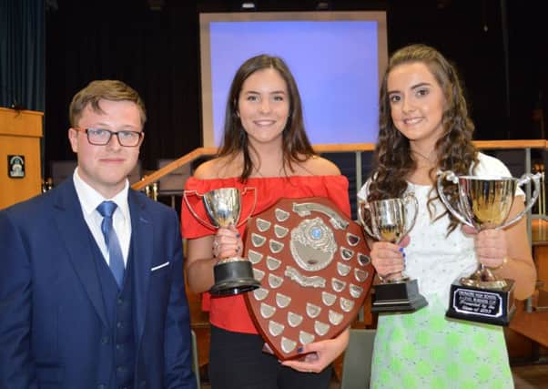 Alex Girvan with the Lilburn Cup for STEM, Anna Poots with the BL Shield for Best Contribution to Sixth Form and Zara Malcolmson who was awarded the Outstanding Achievement Cup.