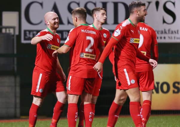 Cliftonville's Ryan Catney celebrates scoring the first goal with his teammates
.