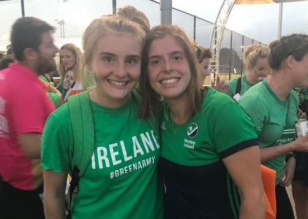 Olivia Mullan (left) with older sister Katie, Ireland captain, at the World Cup in London.