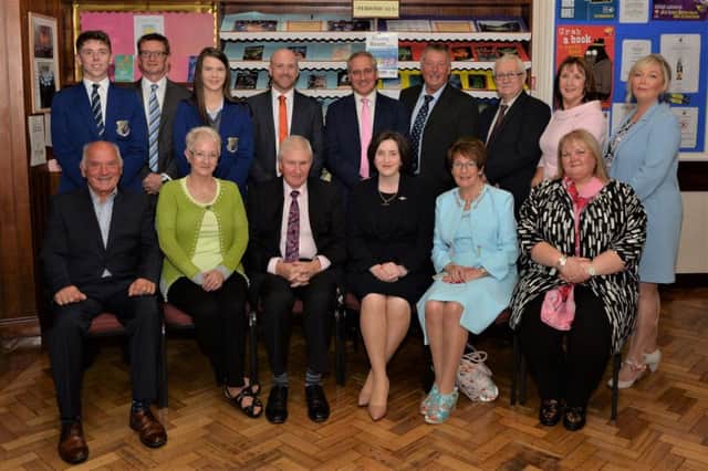 Mr J Brady (centre back) principal of St Killian's College is pictured with staff members and invited guests at the annual distribution of prizes and awards at the college. INLT 39-006-PSB. Pic by Philip Byrne.