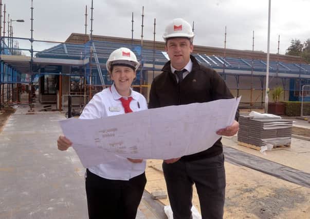 Michelle Hazard, restaurant manager and Gareth Moore, operations supervisor/manager, pictured outside McDonalds, Rushmere which is  due to open after refurbishment on Wednesday 10th October. INLM41-201.