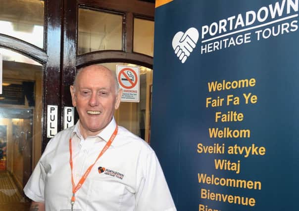 Carleton St Orange Hall tour guide, Bill Partridge, prepares to conduct tours of the hall during Orange Heritage Week. INPT38-217.