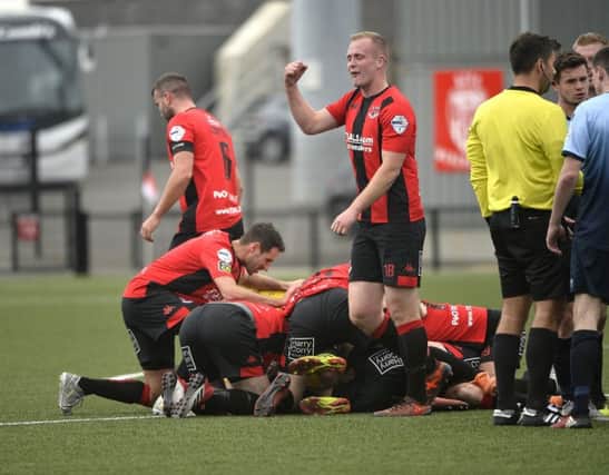 Crusaders players surround Jordan Forsythe after he scored from the half way line

 Mandatory Credit: Stephen Hamilton -Inpho