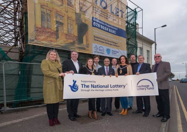 Property owners Sandra Klauer and Mark Cobain, chair of THI Project Board, Cllr Cheryl Johnston, architect John Palmer, Heritage Lottery Funds Mukesh Sharma, Carrickfergus THI manager Frank McGrogan, Mayor of Mid and East Antrim Cllr Lindsay Millar, former and current THI board members Robert Stewart, Paul Bunting and Cllr Billy Ashe.