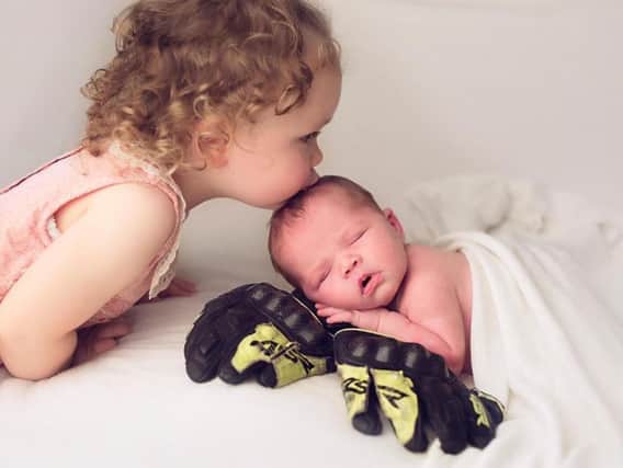 Baby Willa Wren Dunlop with her sister Ella.