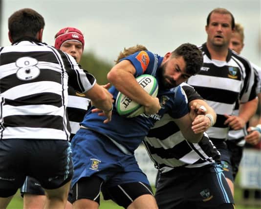 A Portadown attack is stopped by a resolute Ballymoney defence. Photo by Uel McDowell