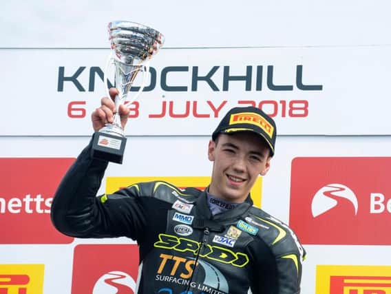 Eunan McGlinchey on the top step of the podium following his victory at Knockhill. PICTURE: James McCann