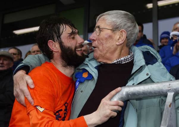 Glenavon's Gary Hamilton celebrates with his grandfather George Dennison after the club's Irish Cup win in 2016. PHOTO MARK MARLOW/PACEMAKER PRESS