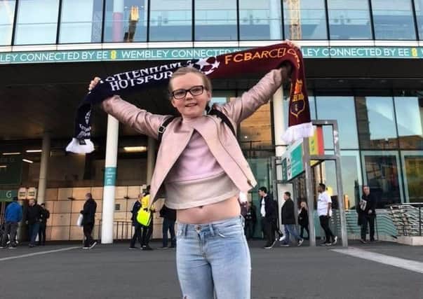 Nine-year-old Spurs supporter Grace Brown, from Dromore in Co Down, outside Wembley