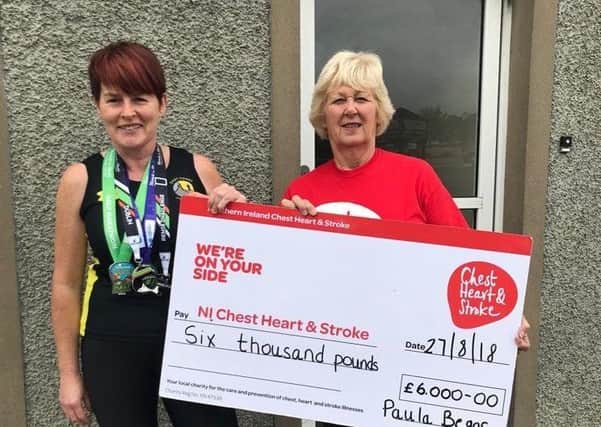 Paula presenting the cheque for Â£6,000 to Valerie Saunders, Community Fundraising Co-ordinator NI Chest Heart & Stroke.