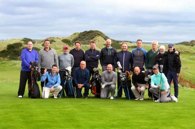 Joe Cruise, Tourism Ireland (left), with the golf journalists on the first tee at Castlerock Golf Club.