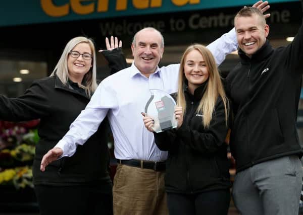 Lusty's Centra Larne celebrate winning Independent Drinks Retailer of the Year. (From left) staff member, Danielle McLaughlin, Lusty's Centra Larne owner, Richard Lusty, staff member, Kirby Webb and store manager, Raymond Lusty. Pic by Matt Mackey, Press Eye.