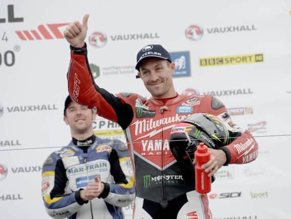 Josh Brookes on the Superbike rostrum at the North West 200 in 2014.