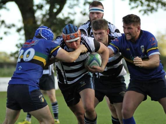 Ballymoney second row, Michael Allen, takes on the Lisburn defence in the KQ2 League match. Photo by Uel McDowell