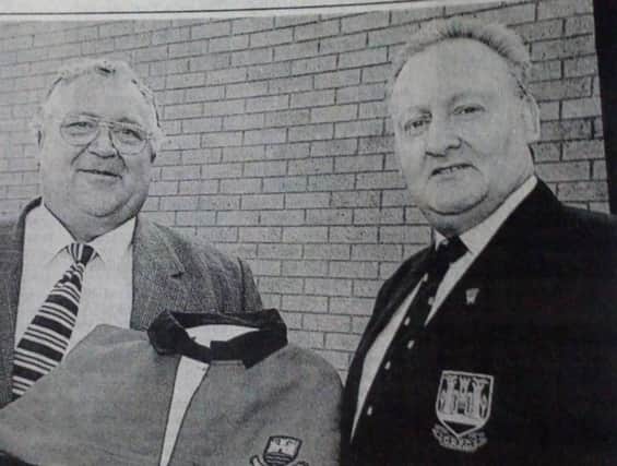 Carrick Rugby Club has a new kit. Sponsored by NK Coating, its managing director Roy Davidson is pictured here with the Club's president, Arnold Ritchhie. 1991.