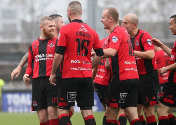 Crusaders celebrate a 3-0 success over Glentoran. Pic by Pacemaker.