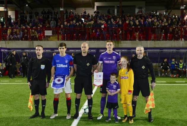 The captains pictured with the match officials. Picture By: Arthur Allison: Pacemaker Press.